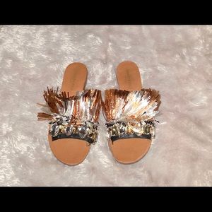 Kenneth Cole side on Sandals